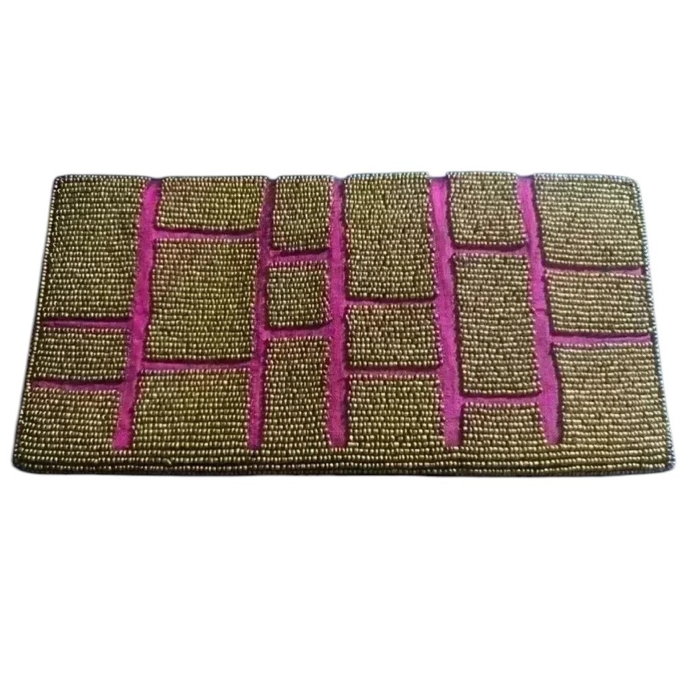 ExpressionsNYC clutch. Pick with gold beads. Good condition pink sink inside
